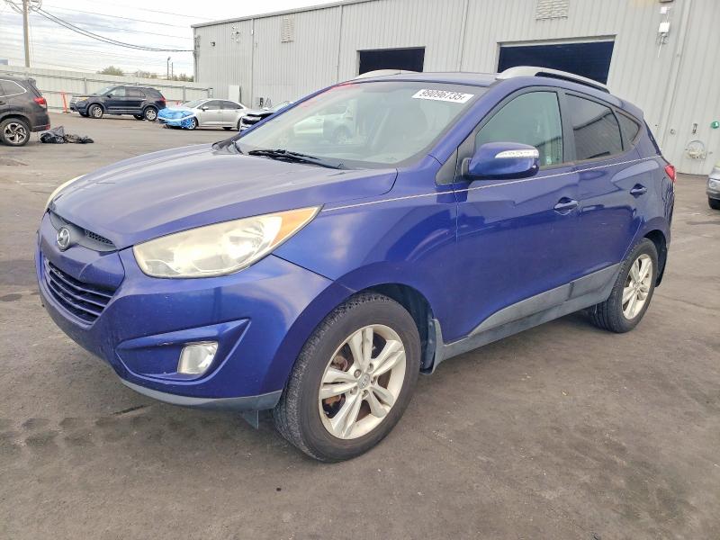 HYUNDAI TUCSON 2013 with VIN KM8JU3AC0DU615483 - Photo from auction