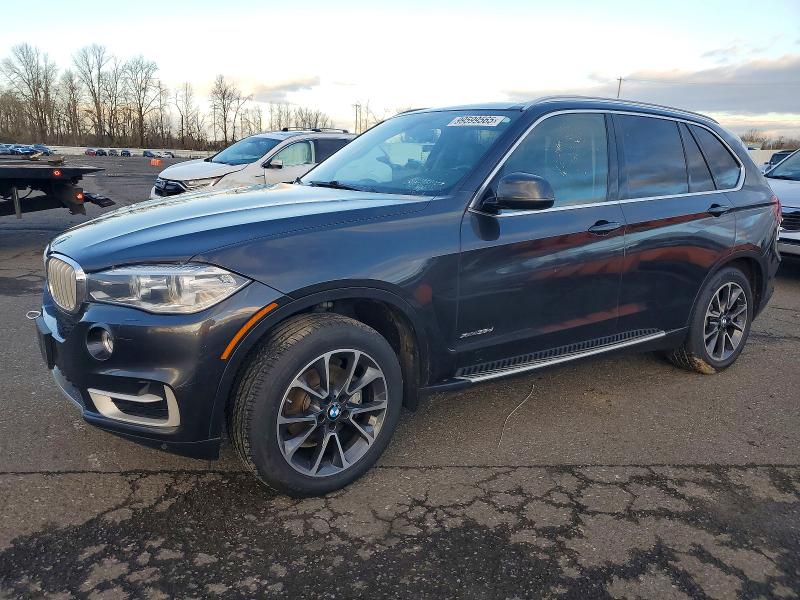 BMW X5 XDRIVE3 2015 with VIN 5UXKS4C59F0N10310 - Photo from auction