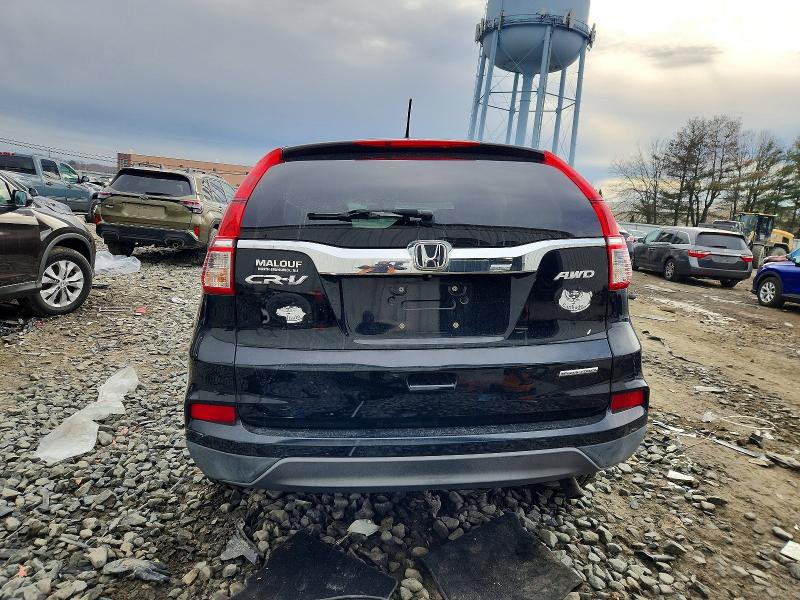 Photo 6 from auction – 2016 HONDA CR-V SE with VIN 2HKRM4H43GH656832