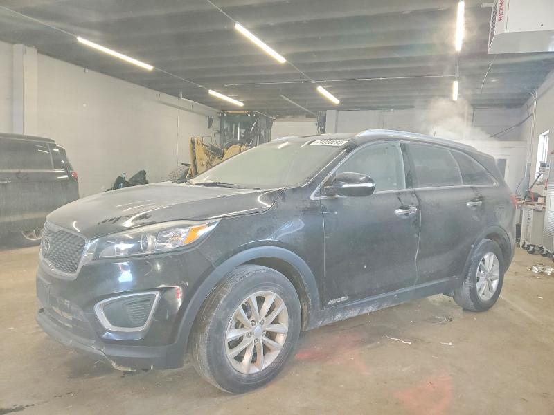 KIA SORENTO LX 2016 with VIN 5XYPGDA5XGG177610 - Photo from auction