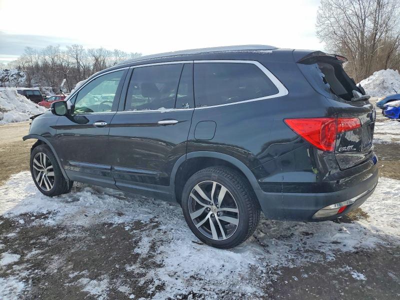 Photo 2 from auction – 2017 HONDA PILOT ELIT with VIN 5FNYF6H07HB027833