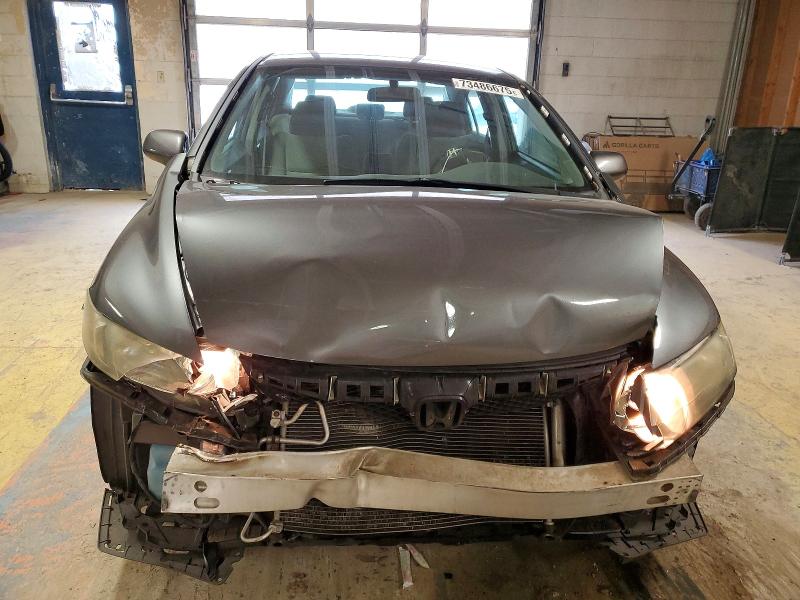 Photo 5 from auction – 2010 HONDA CIVIC LX with VIN 19XFA1F53AE030229