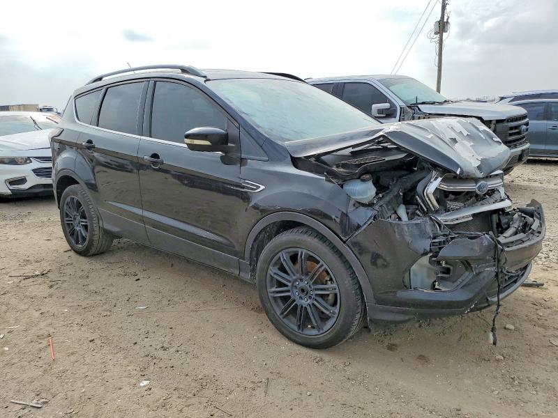 Photo 4 from auction – 2017 FORD ESCAPE TIT with VIN 1FMCU0JD5HUD04489