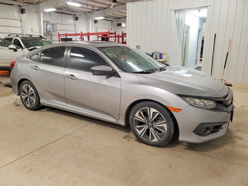 Photo 4 from auction – 2016 HONDA CIVIC EX with VIN 19XFC1F39GE029099