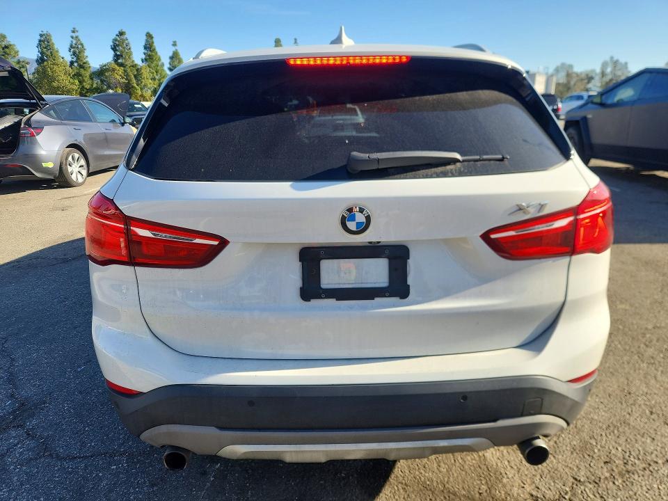 Photo 6 from auction – 2017 BMW X1 with VIN WBXHU7C31H5H33362