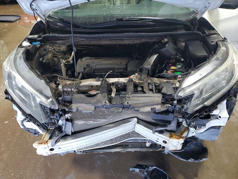 Photo 12 from auction – 2016 HONDA CR-V LX with VIN 5J6RM4H33GL005147
