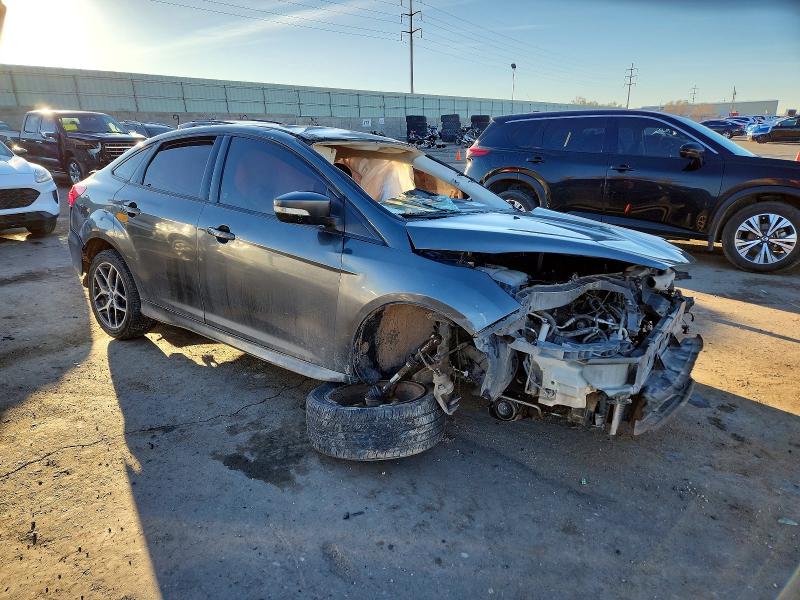 Photo 4 from auction – 2016 FORD FOCUS with VIN 1FADP3F24GL380577