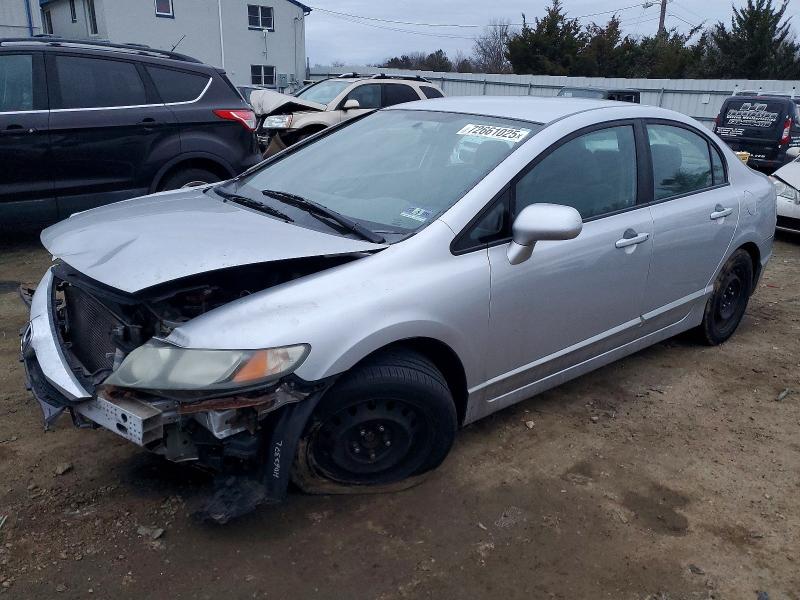 HONDA CIVIC LX 2011 with VIN 19XFA1F50BE042565 - Photo from auction