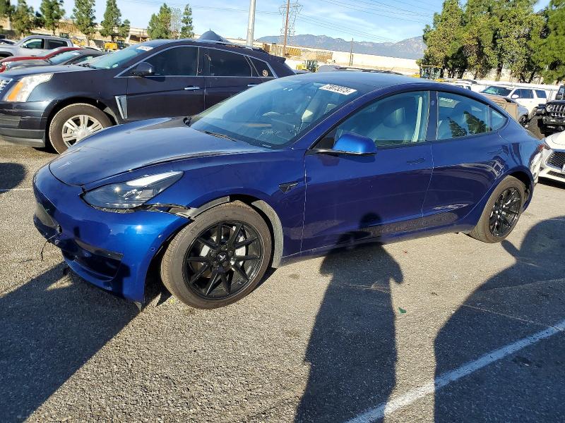 TESLA MODEL 3 2022 with VIN 5YJ3E1EA6NF318672 - Photo from auction