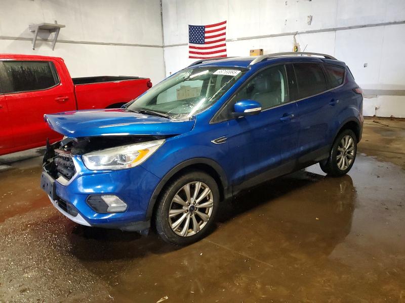 FORD ESCAPE TIT 2017 with VIN 1FMCU9J99HUA27331 - Photo from auction