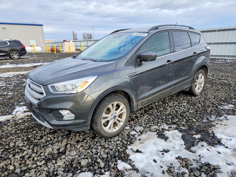 Photo 1 from auction – 2018 FORD ESCAPE SEL with VIN 1FMCU9HD1JUA98667