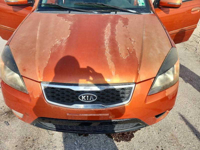 Photo 11 from auction – 2010 KIA RIO LX with VIN KNADH4A38A6644609