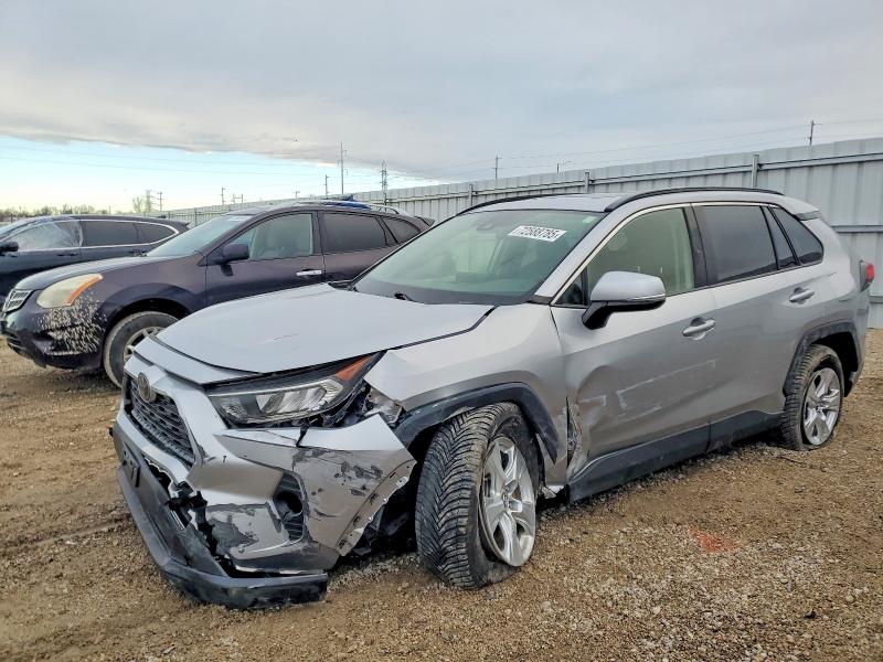 TOYOTA RAV4 XLE 2019 with VIN JTMP1RFV4KJ017478 - Photo from auction