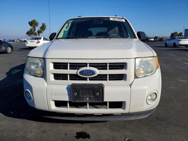 Photo 5 from auction – 2009 FORD ESCAPE with VIN 1FMCU49329KA56234