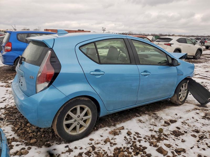 Photo 3 from auction – 2015 TOYOTA PRIUS C with VIN JTDKDTB35F1100829