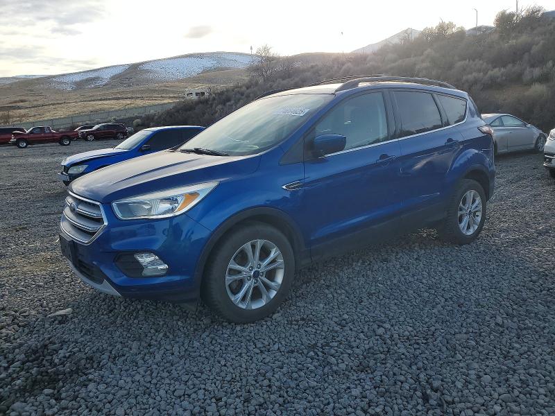FORD ESCAPE SE 2018 with VIN 1FMCU9GD8JUB45484 - Photo from auction