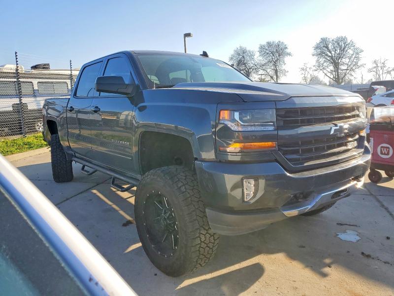 Photo 4 from auction – 2018 CHEVROLET SILVERADO with VIN 3GCUKREC1JG260262