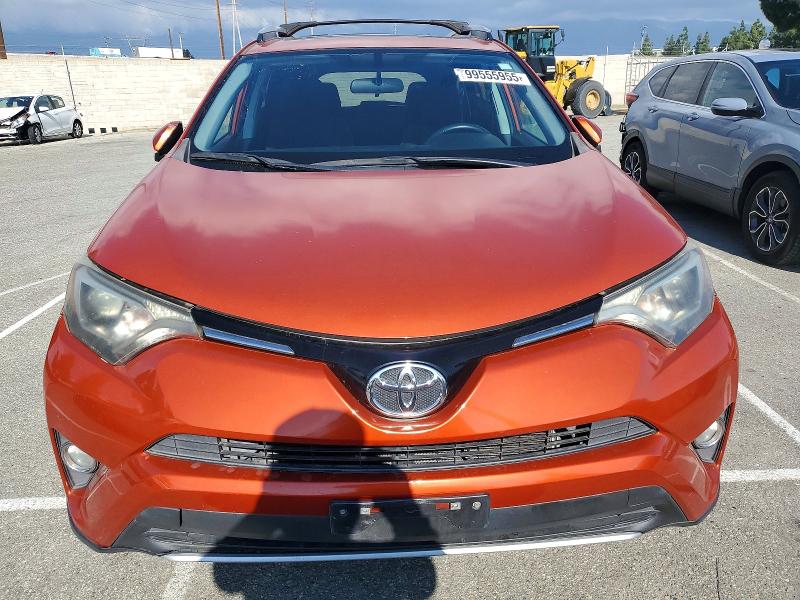 Photo 5 from auction – 2016 TOYOTA RAV4 with VIN 2T3WFREVXGW256492