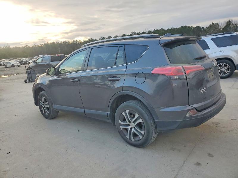 Photo 2 from auction – 2018 TOYOTA RAV4 LE with VIN JTMZFREV6JJ211147