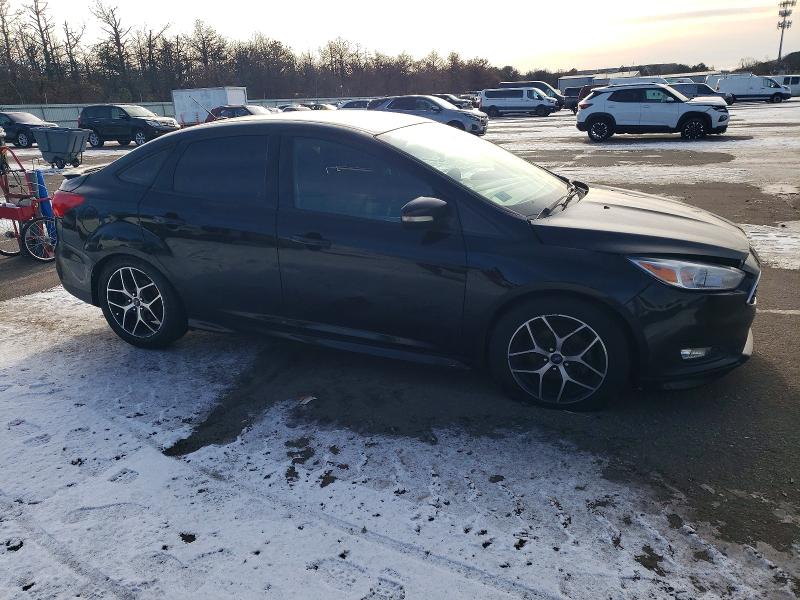 Photo 4 from auction – 2016 FORD FOCUS with VIN 1FADP3F25GL237055