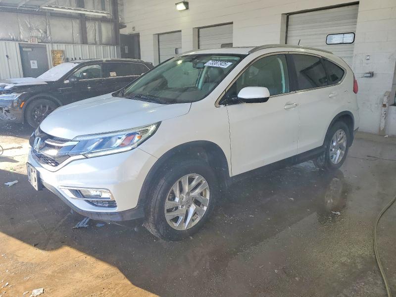 Photo 1 from auction – 2015 HONDA CR-V EXL with VIN 5J6RM4H70FL025387