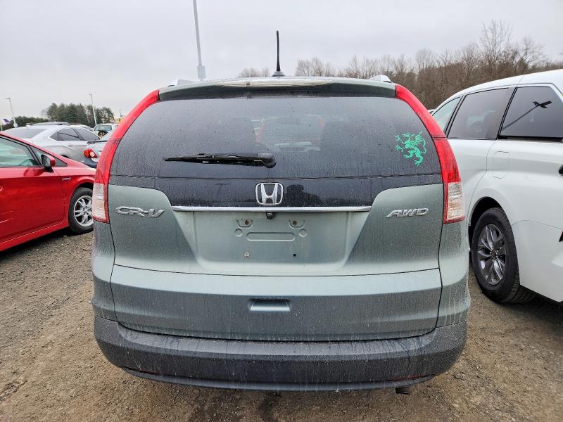 Photo 6 from auction – 2012 HONDA CR-V with VIN 2HKRM4H75CH625375