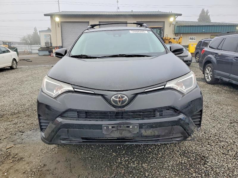Photo 5 from auction – 2018 TOYOTA RAV4 LE with VIN 2T3BFREV7JW808942