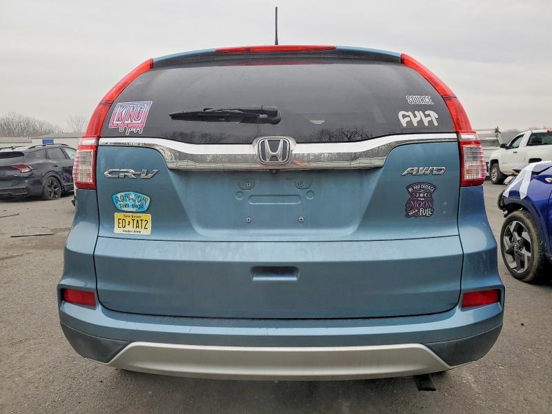 Photo 6 from auction – 2015 HONDA CR-V with VIN 5J6RM4H73FL050042