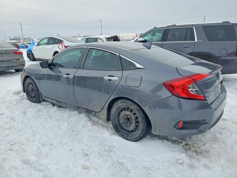 Photo 2 from auction – 2016 HONDA CIVIC TOUR with VIN 2HGFC1F98GH101629