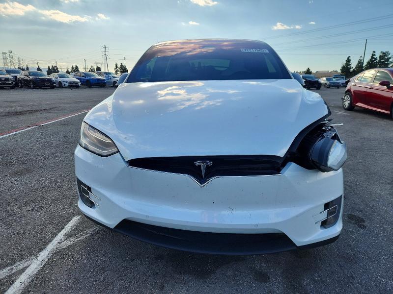 Photo 5 from auction – 2018 TESLA MODEL X with VIN 5YJXCAE24JF090181