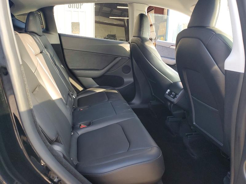 Photo 10 from auction – 2023 TESLA MODEL Y with VIN 7SAYGDEE2PF748354