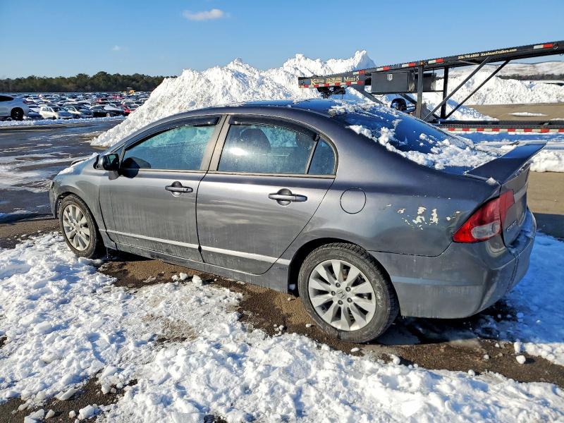 Photo 2 from auction – 2010 HONDA CIVIC EX with VIN 19XFA1F83AE073317