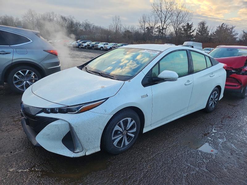TOYOTA PRIUS PRIM 2018 with VIN JTDKARFP7J3083327 - Photo from auction