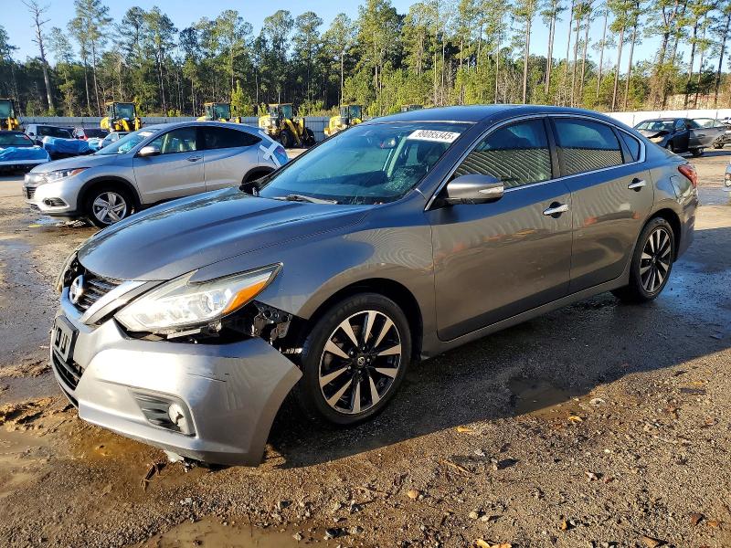 NISS ALTIMA 2018 with VIN 1N4AL3AP6JC195567 - Photo from auction