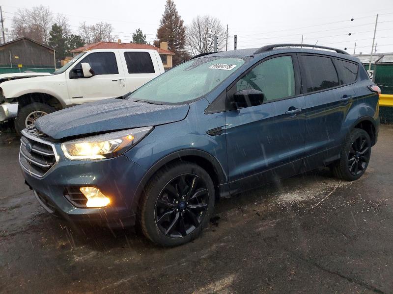 FORD ESCAPE SE 2018 with VIN 1FMCU9GD8JUC95210 - Photo from auction