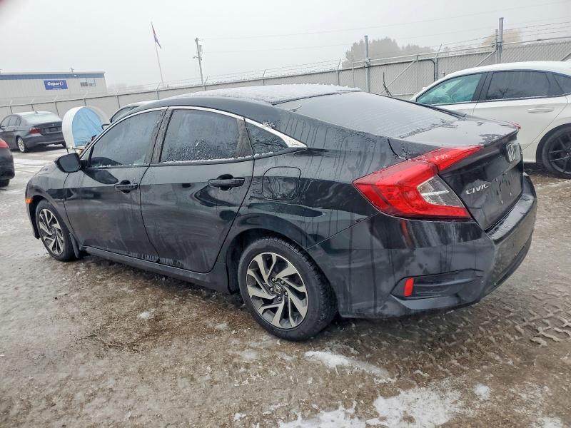 Photo 2 from auction – 2017 HONDA CIVIC EX with VIN 2HGFC2F81HH041028