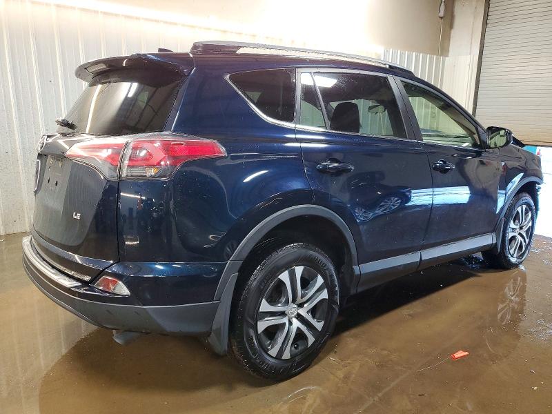 Photo 3 from auction – 2018 TOYOTA RAV4 LE with VIN JTMZFREV6JJ174536