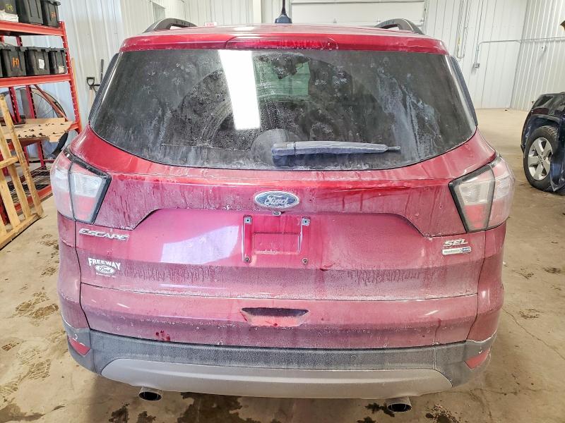 Photo 6 from auction – 2018 FORD ESCAPE SEL with VIN 1FMCU9HD5JUC08264