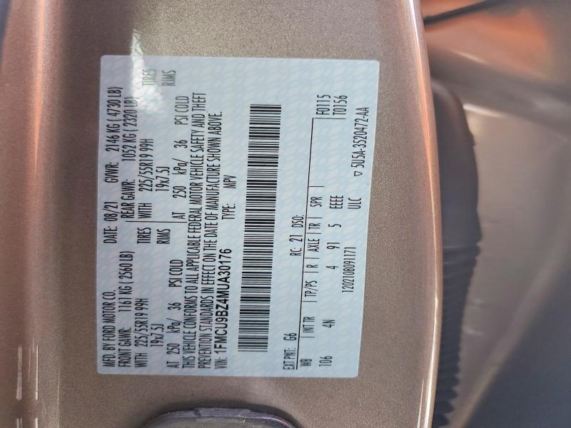 Photo 14 from auction – 2021 FORD ESCAPE SE with VIN 1FMCU9BZ4MUA30176