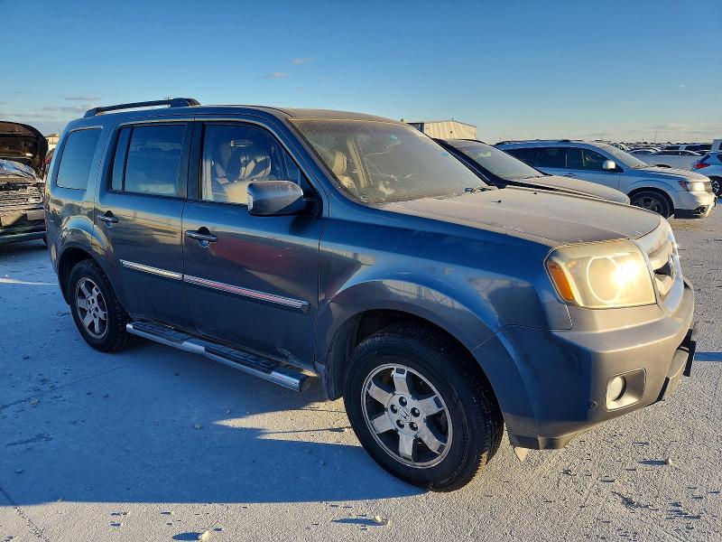 Photo 4 from auction – 2011 HONDA PILOT TOUR with VIN 5FNYF3H98BB003836