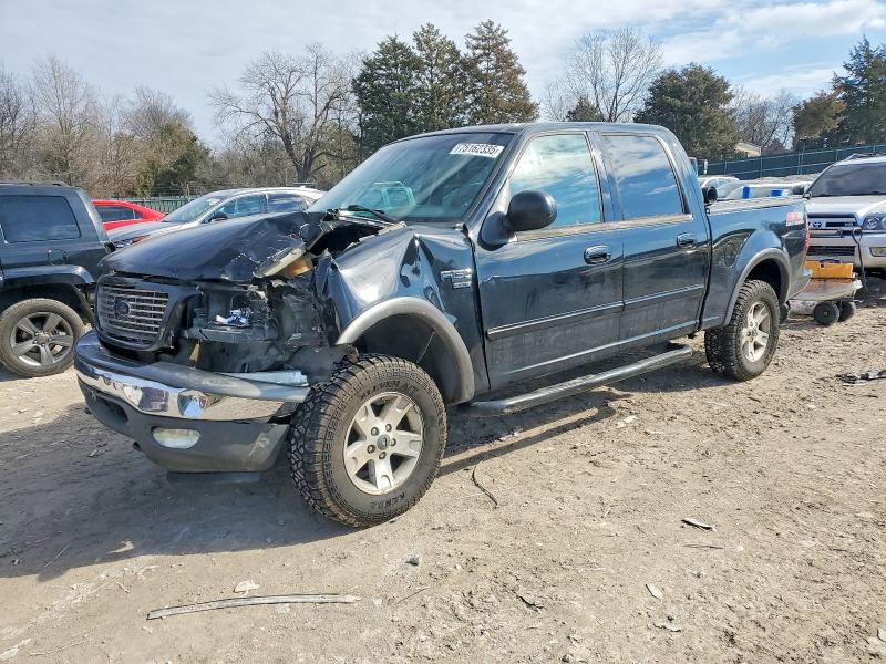 FORD F150 2002 with VIN 1FTRW08L72KE25775 - Photo from auction