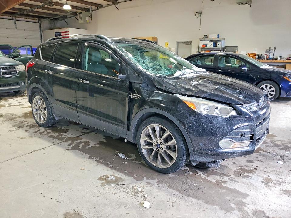 Photo 4 from auction – 2016 FORD ESCAPE with VIN 1FMCU9GX7GUA58534