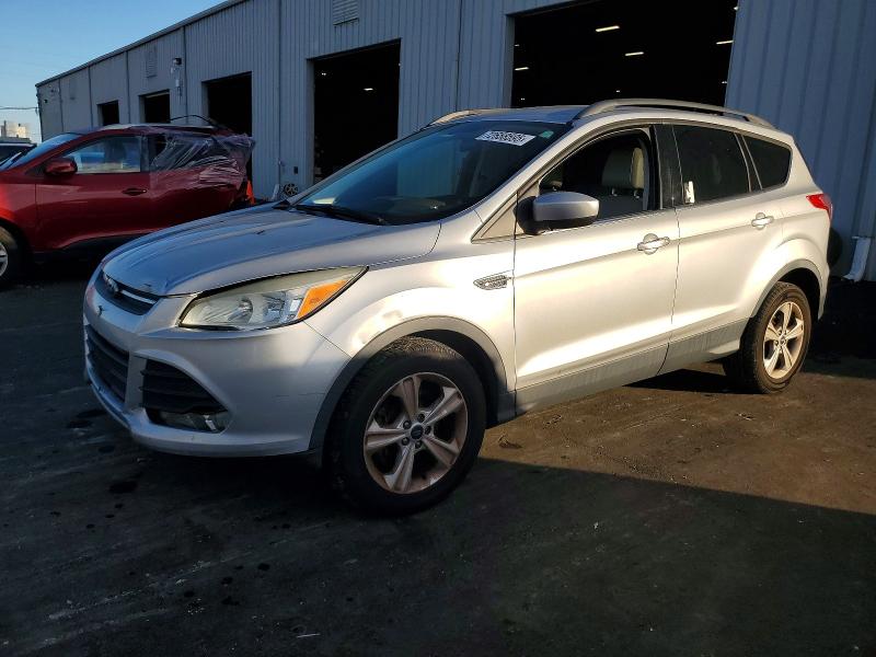 FORD ESCAPE SE 2014 with VIN 1FMCU0GX7EUB12584 - Photo from auction