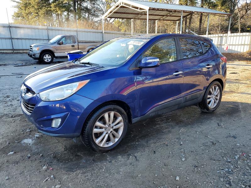 HYUNDAI TUCSON 2011 with VIN KM8JU3AC2BU147527 - Photo from auction