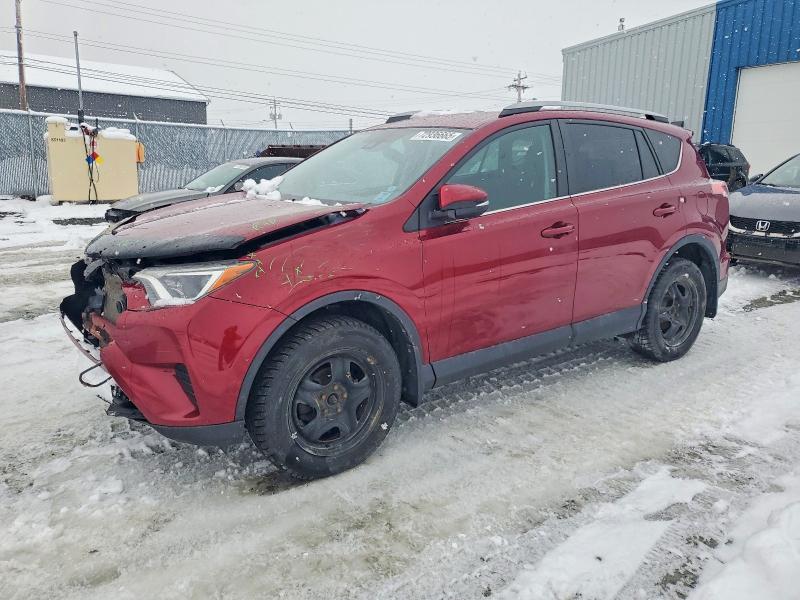 TOYOTA RAV4 LE 2018 with VIN 2T3BFREV9JW840484 - Photo from auction