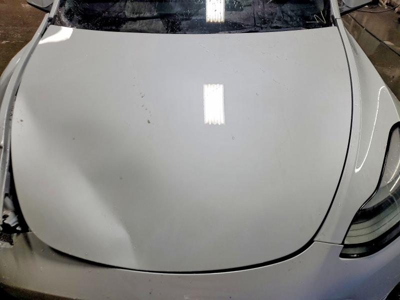 Photo 11 from auction – 2023 TESLA MODEL Y with VIN 7SAYGDEE7PF803039
