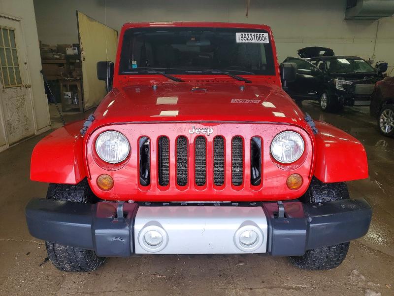 Photo 5 from auction – 2011 JEEP WRANGLER U with VIN 1J4BA5H12BL520079