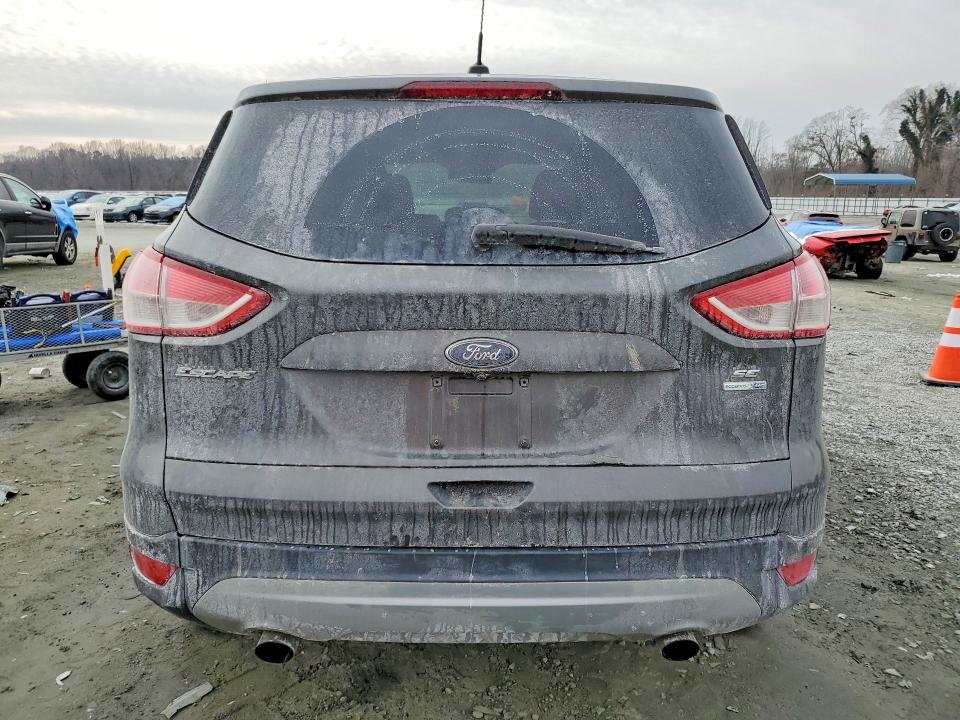 Photo 6 from auction – 2016 FORD ESCAPE SE with VIN 1FMCU9GXXGUA74419