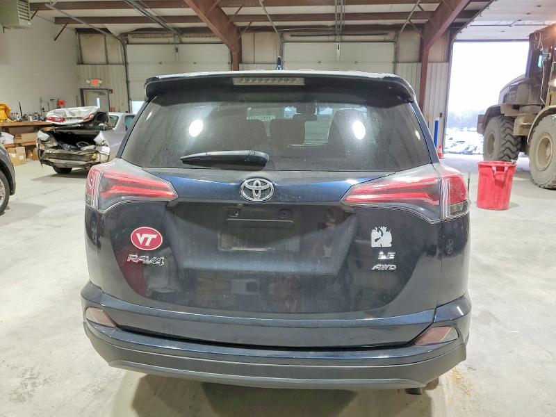 Photo 6 from auction – 2017 TOYOTA RAV4 LE with VIN JTMBFREV0HJ170588