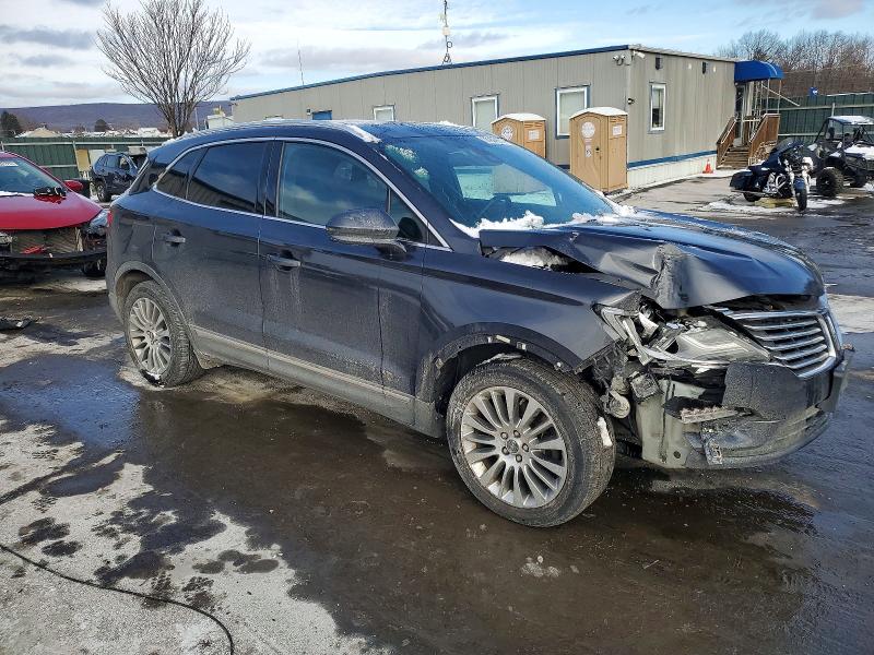 Фото 4 с аукциона – 2015 LINCOLN MKC с VIN 5LMTJ2AH2FUJ22394